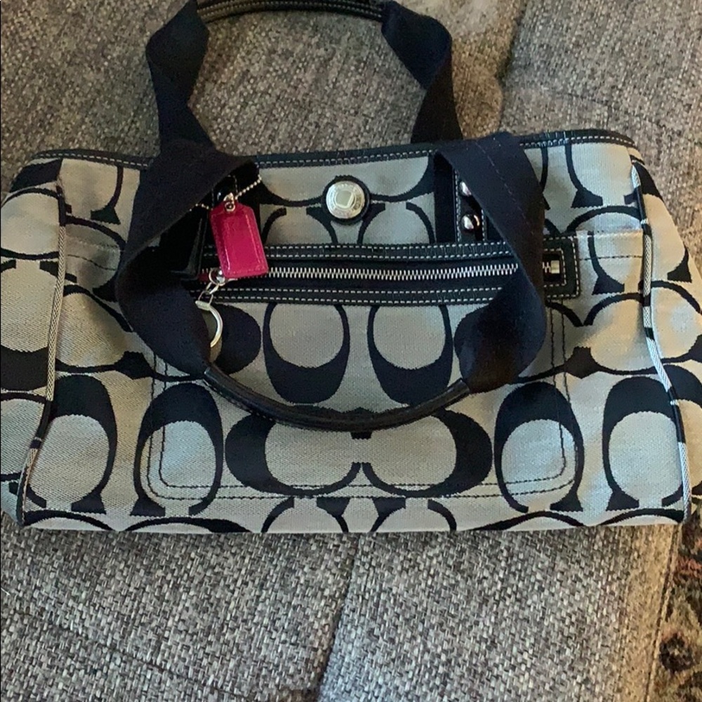 Black and grey (pink on inside) coach purse
